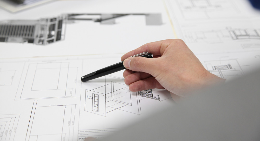 blueprint-pointing-very-closeup-cadplans(1).jpg